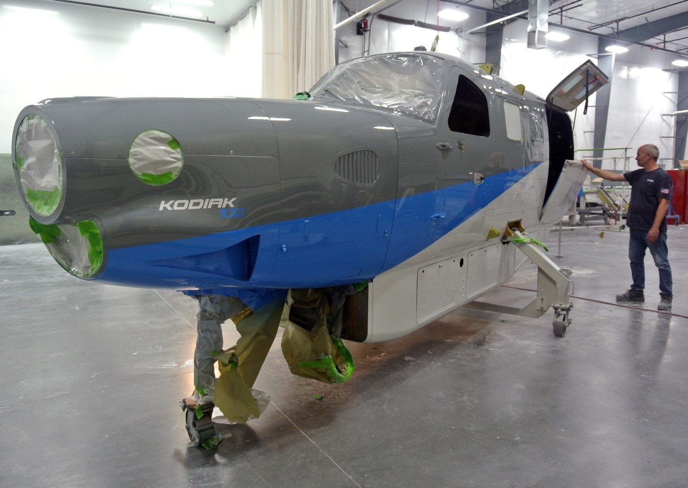 A Kodiak 100 fuselage is inspected